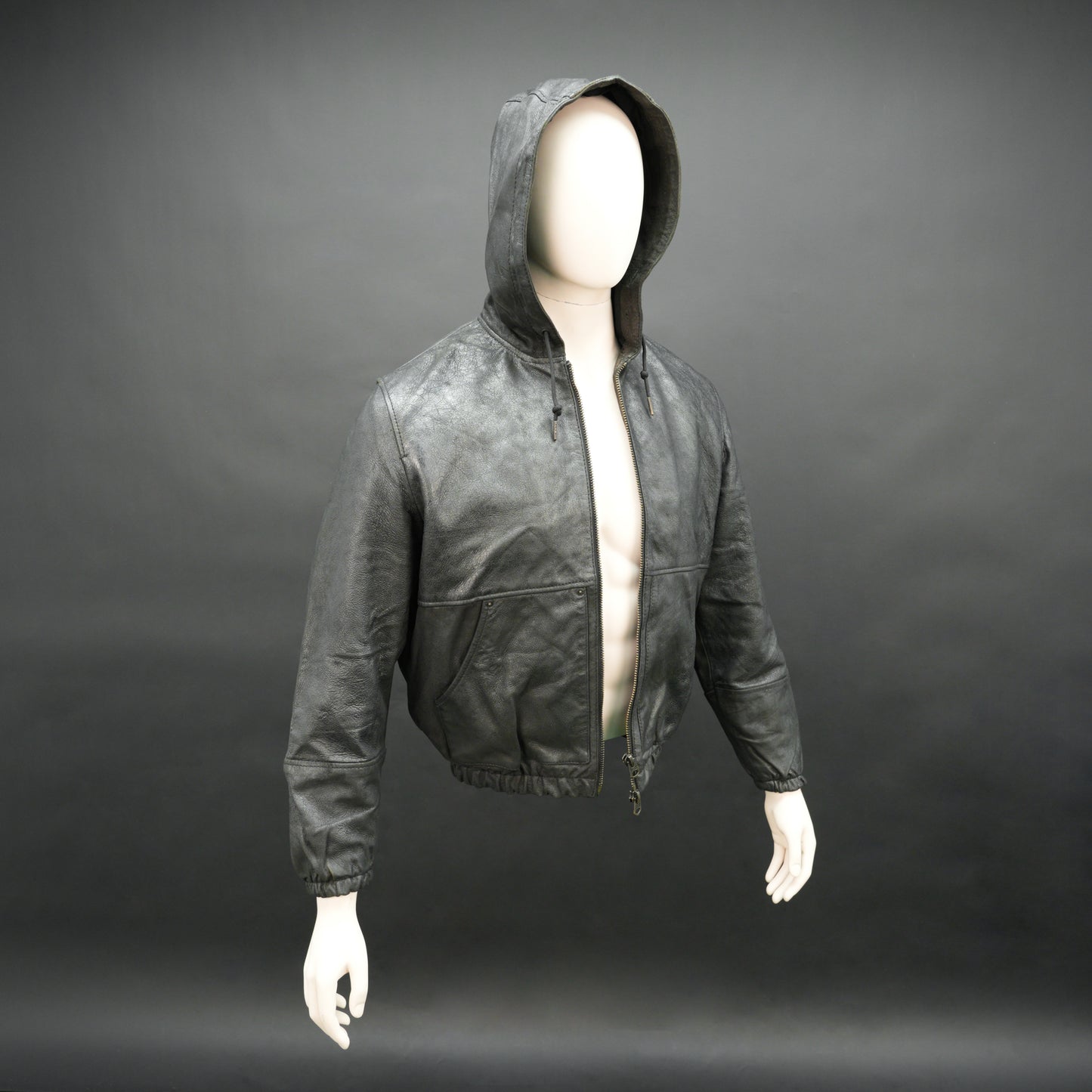 Black hoodie-style jacket made from genuine sheep leather (veg ranger), featuring a front zip closure, adjustable hood, two side pockets, and one inside pocket