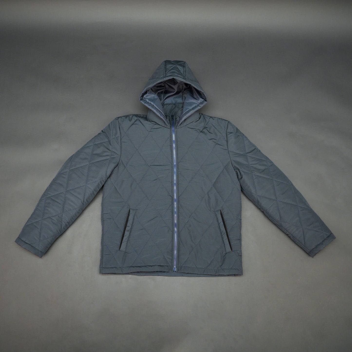 Navy full-sleeve puffer jacket with zip and hood, side and inner pockets, suitable for cold and windy weather