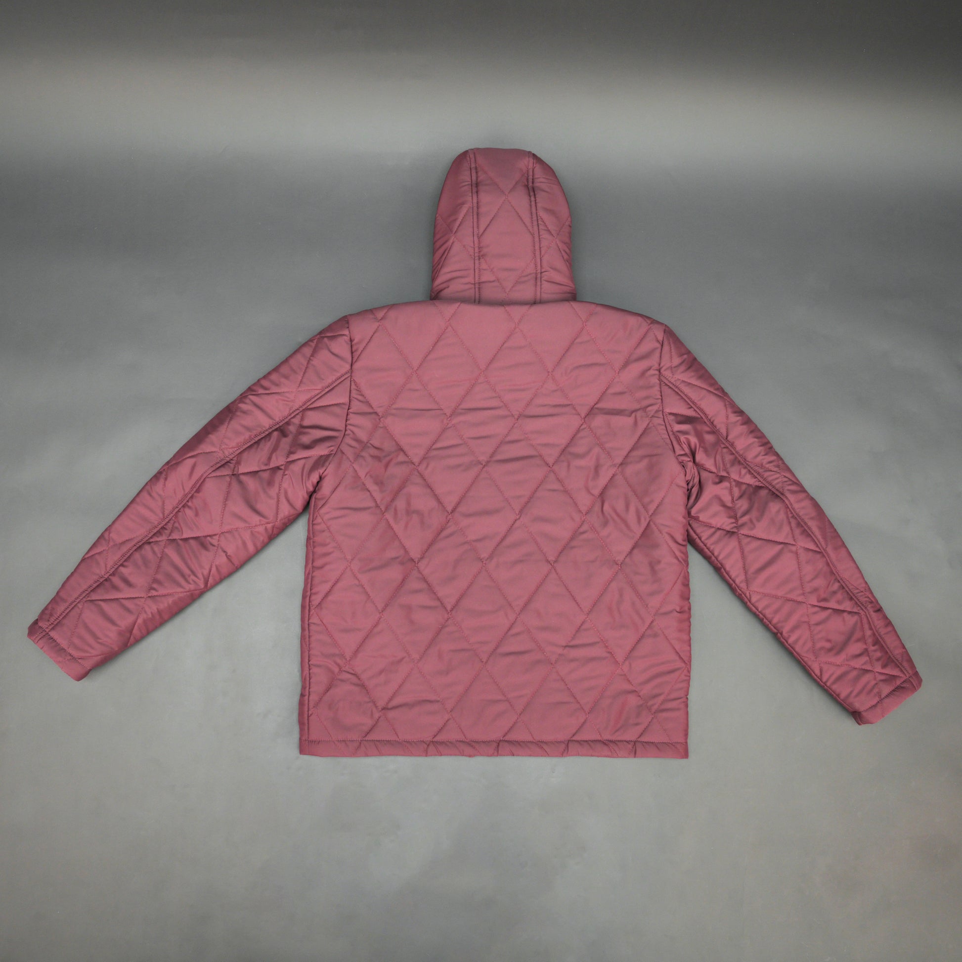 Maroon full-sleeve puffer jacket with zip and hood, side and inner pockets, suitable for cold and windy weather