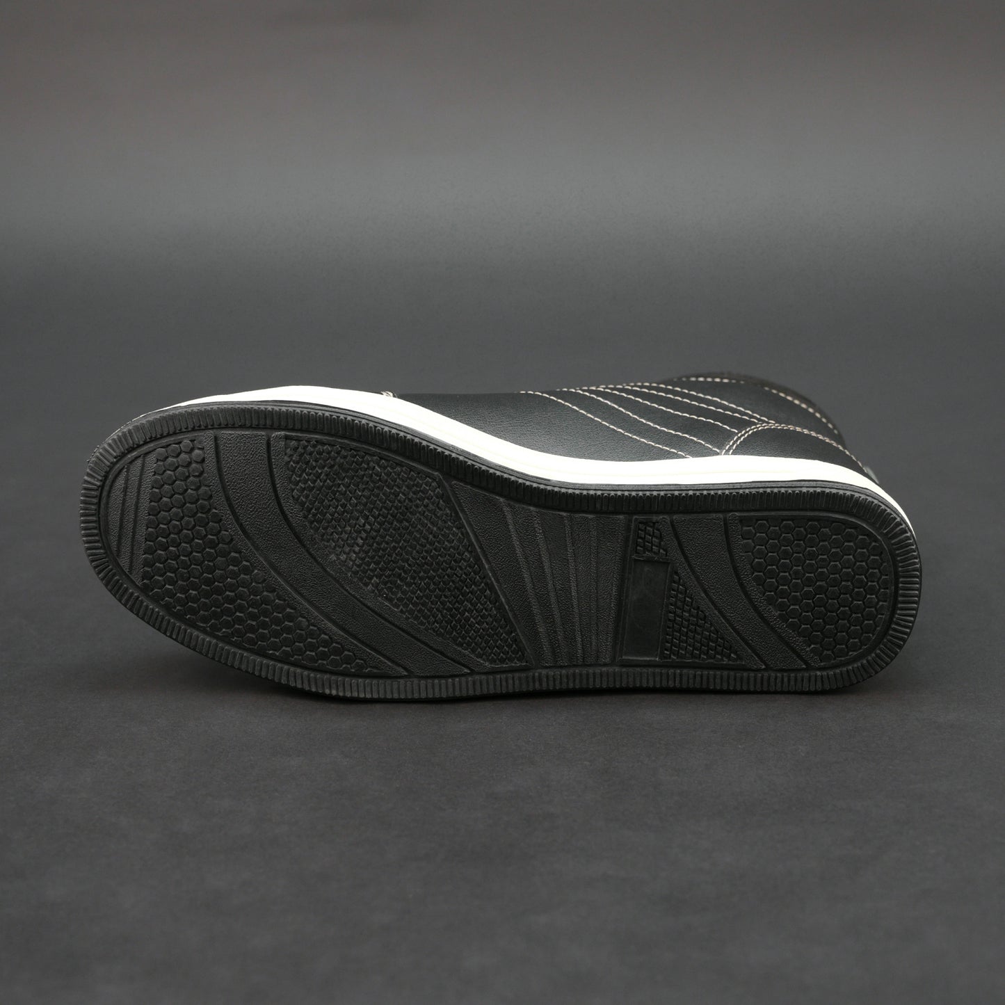 Black high-top bovine leather sneakers with white stitching and white sole.