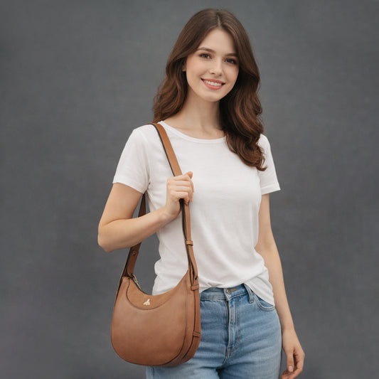 Leather Loop Bag in 100% genuine cowhide leather featuring an elegant loop handle, spacious interior, and durable stitching—perfect for work and everyday casual wear.