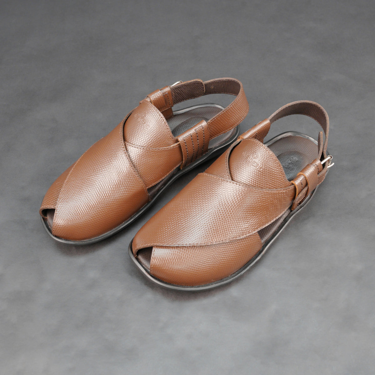 Leather Peshawari #Desiderio #LeatherPeshawari #TanLeather #PeshawariChappal #GenuineLeather #MensFootwear #TraditionalFootwear #LeatherShoes