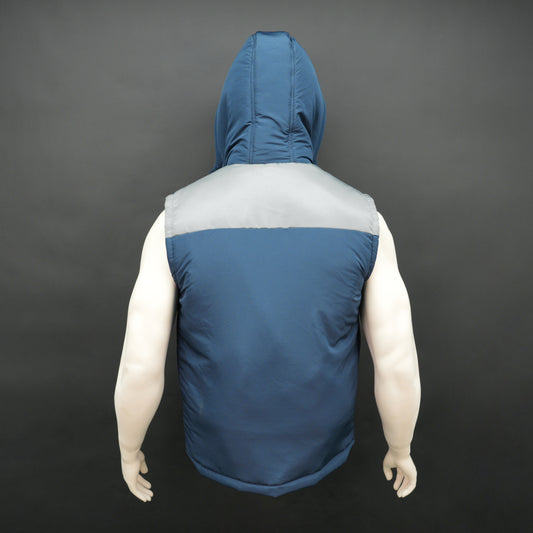 Men’s blue/grey hooded sleeveless puffer vest with zip and snap closure, lightweight and pocketed.