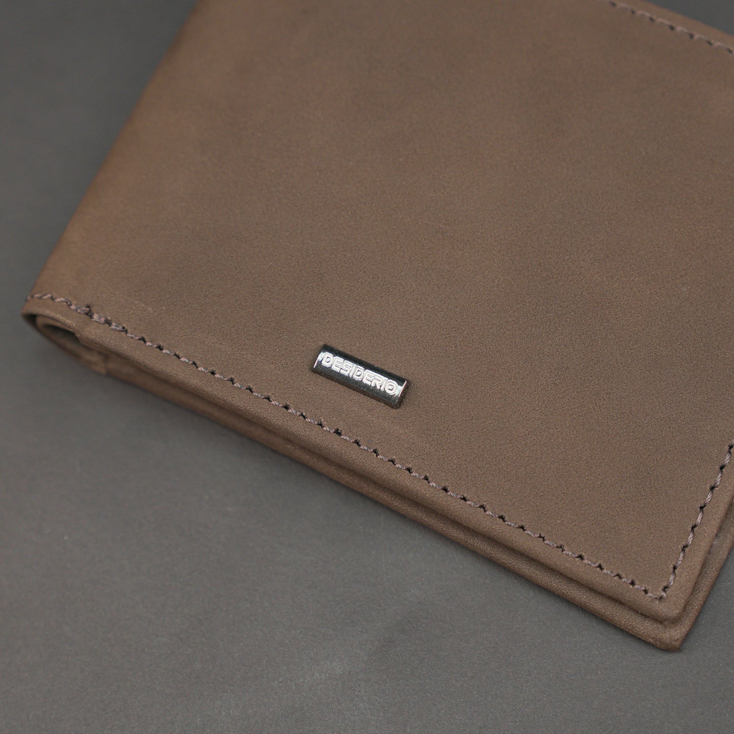 Premium chocolate leather wallet, slim, durable, and lightweight holds 10 cards with 2 cash compartments.