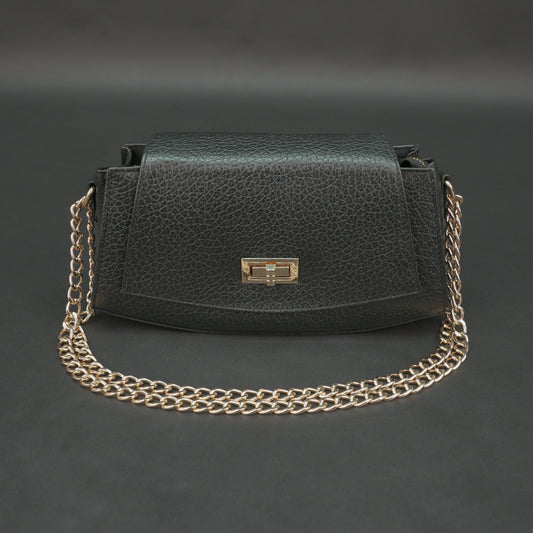 Black real leather handbag with brass chain and zip compartment.