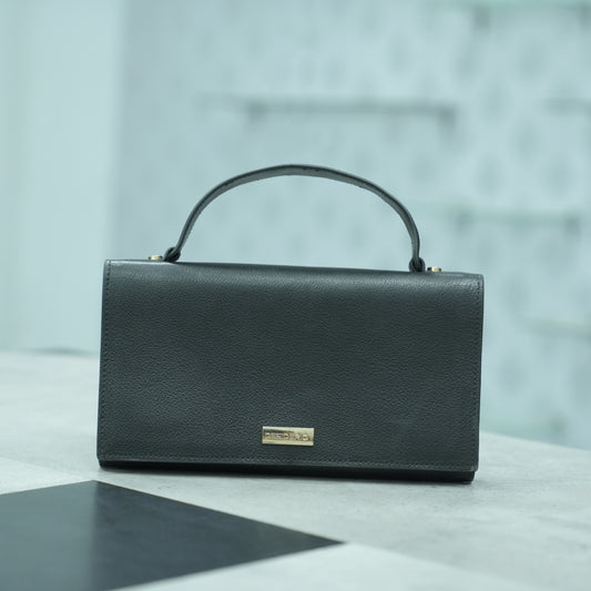 Black leather Grab Handle bag with a minimalist design, featuring a sturdy top handle and two open pockets, combining style and functionality for everyday use