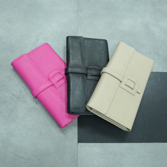Compact and elegant mini clutch made from premium genuine leather, available in beige, black, and pink, featuring 3 main compartments, 16 card slots, and a secure zip pocket—perfect for stylish everyday use