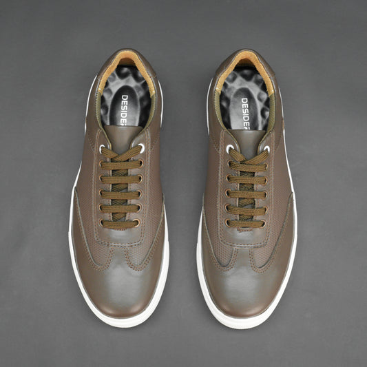 Short boot featuring brown premium printed cow leather, breathable mesh lining, supportive non-woven insole, and flexible TPR outsole for all-day comfort