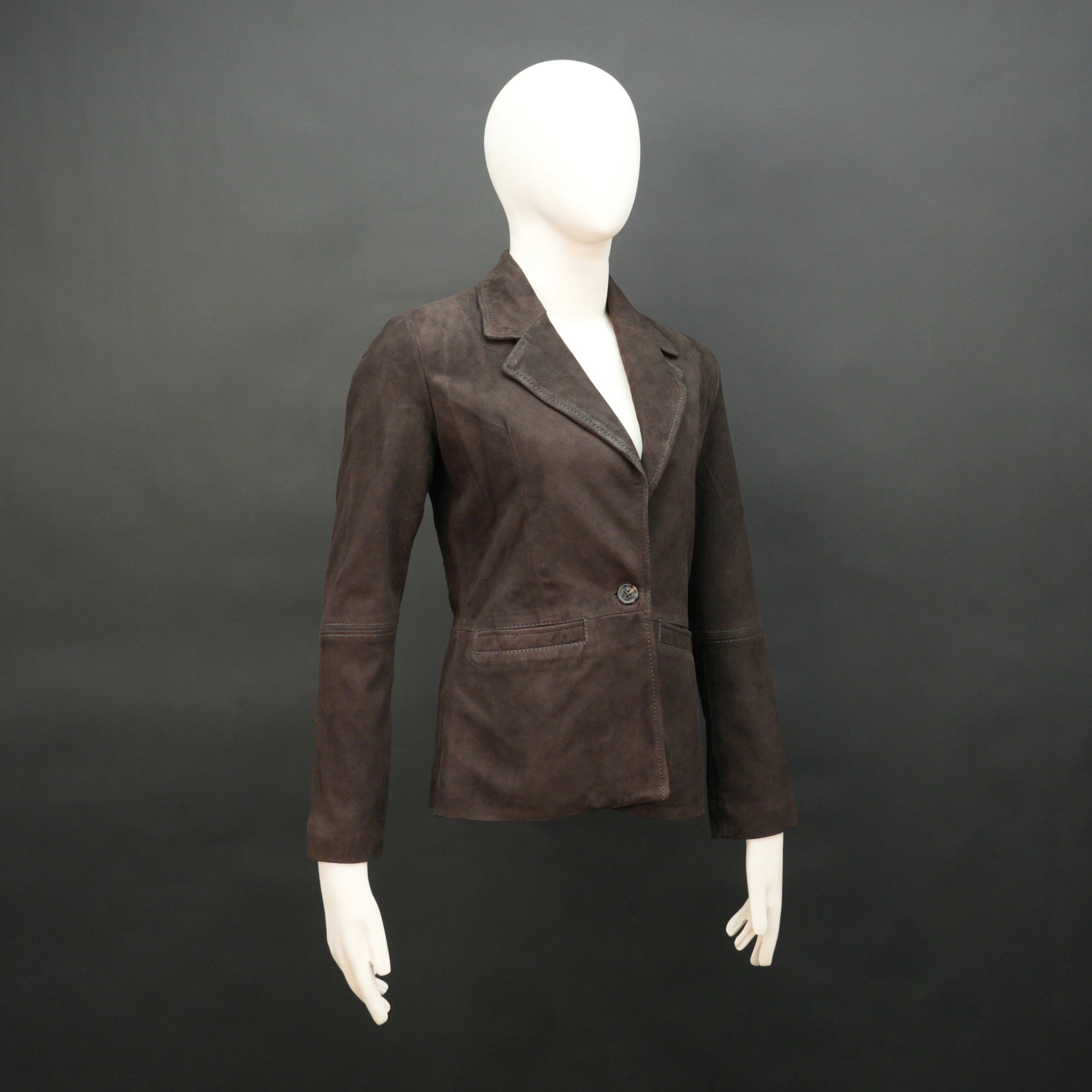 Dark brown goat leather coat with soft, durable material, two functional pockets, and versatile design for casual and formal wear