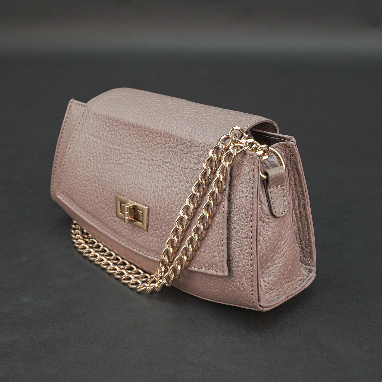 Real leather handbag with brass color chain, zipper compartment, shoulder and hand straps, available in multiple colors for daily use