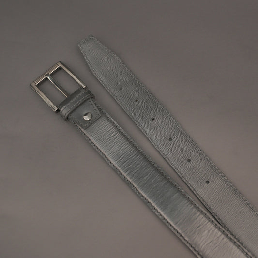 Premium leather belt with solid one-piece construction, charcoal metal buckle, durable, adjustable, stylish for jeans and dress wear