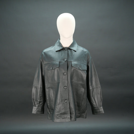 Black leather jacket with button closure, flap pockets, and relaxed fit.