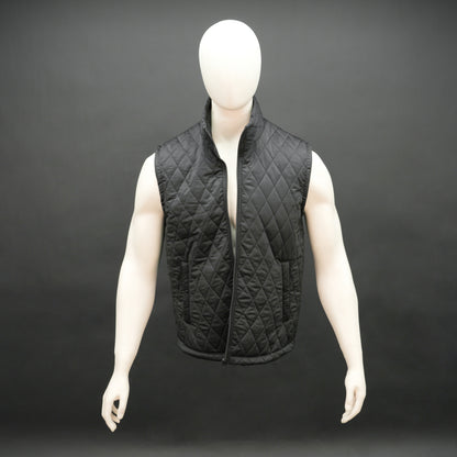 Lightweight black quilted sleeveless  puffer vest with zip closure, side and inside pockets, ideal for layering
