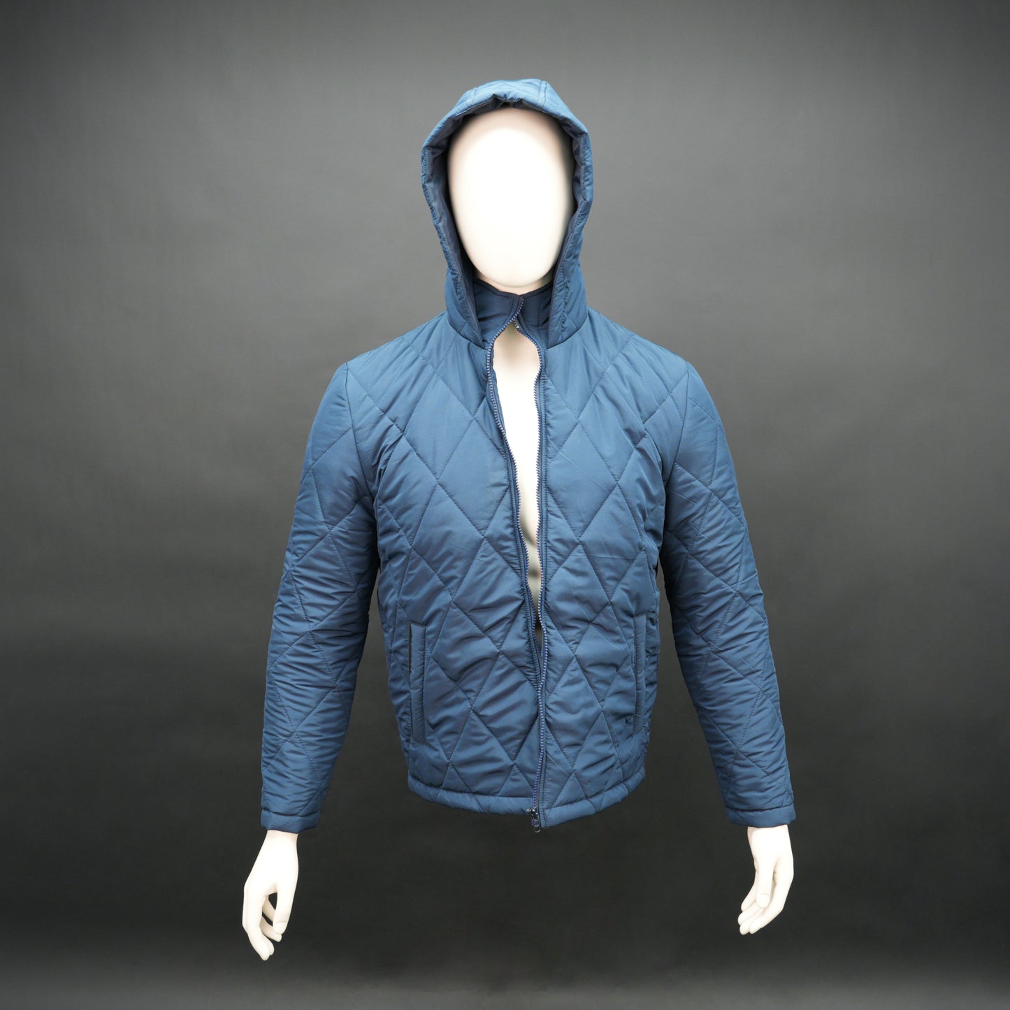 Blue full-sleeve puffer jacket with zip and hood, side and inner pockets, suitable for cold and windy weather