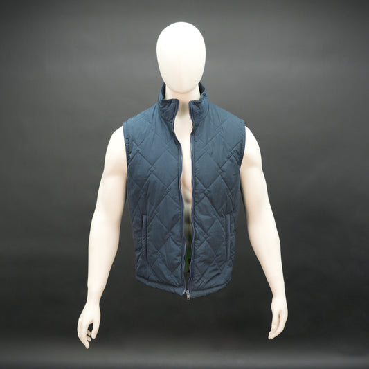Lightweight navy sleeveless puffer vest with zip closure, side and inside pockets, for layering