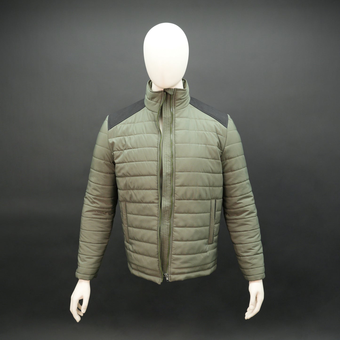 Olive sleeveless puffer vest with zip, side and inside pockets, lightweight for layering