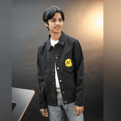 Men’s green and black denim jacket with bold ‘Stay Blessed’ graphic on the back, button-down front, adjustable cuffs, and side pockets