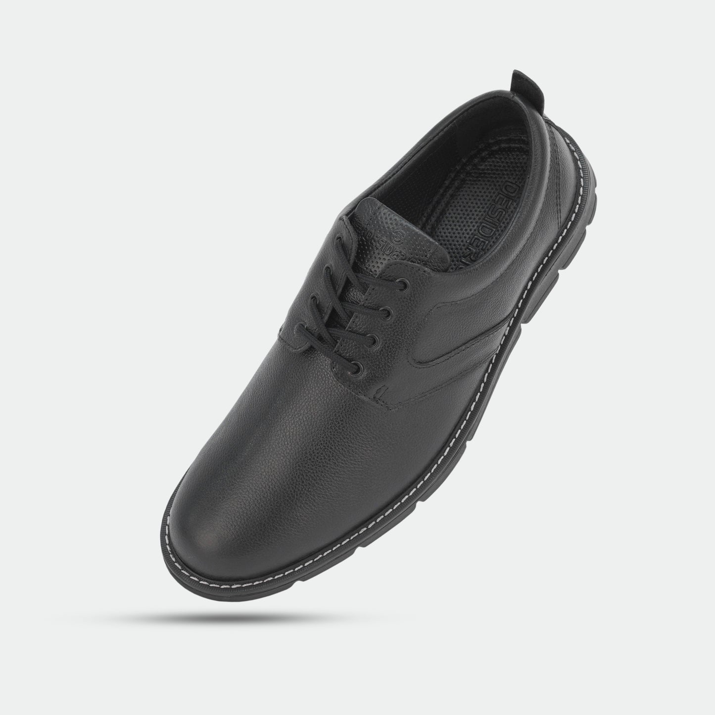 Black footwear featuring genuine cow leather milled commute upper, soft sheep lining, Taxon insole for stability, and lightweight EVA sole for comfort and grip