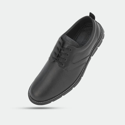 Black footwear featuring genuine cow leather milled commute upper, soft sheep lining, Taxon insole for stability, and lightweight EVA sole for comfort and grip