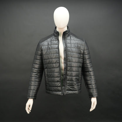 Black full-sleeve two-tone puffer jacket with snap pockets, quilted insulation, inner compartments, and zip closure
