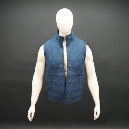 Blue sleeveless puffer vest with zip, side and inside pockets, lightweight for layering