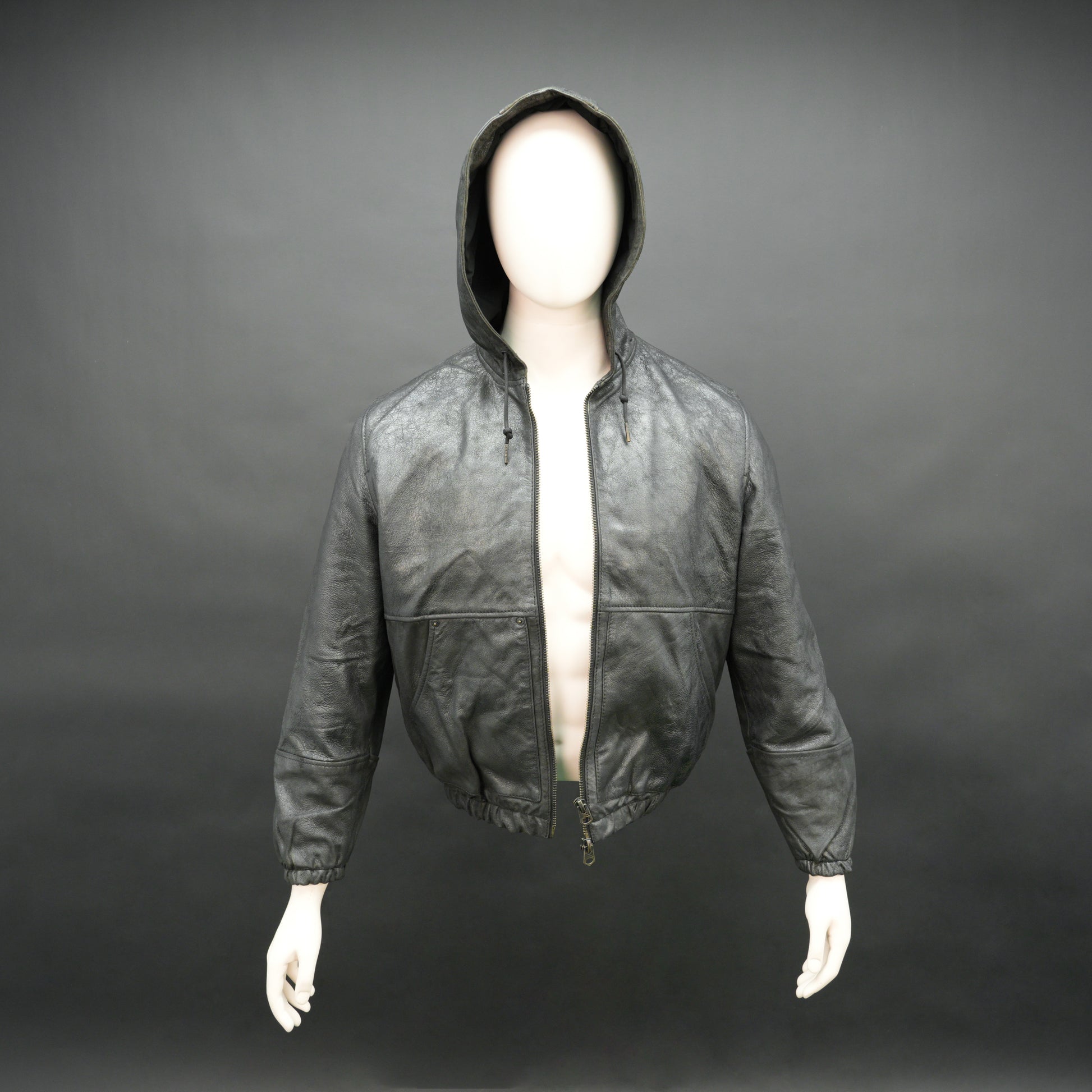 Black hoodie-style jacket made from genuine sheep leather (veg ranger), featuring a front zip closure, adjustable hood, two side pockets, and one inside pocket