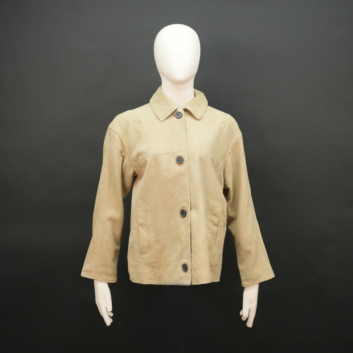 Beige suede leather jacket with tailored fit, elegant button opening, and front side pockets