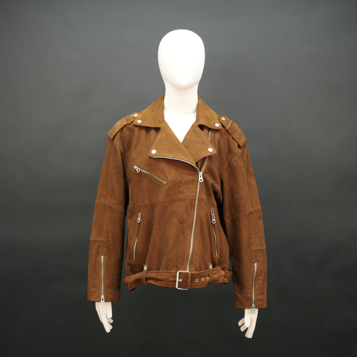 Light brown goat suede perfecto jacket with leather-look finish, soft texture, three exterior pockets, side zip pocket, and adjustable zipped cuffs. Minor fault, no returns