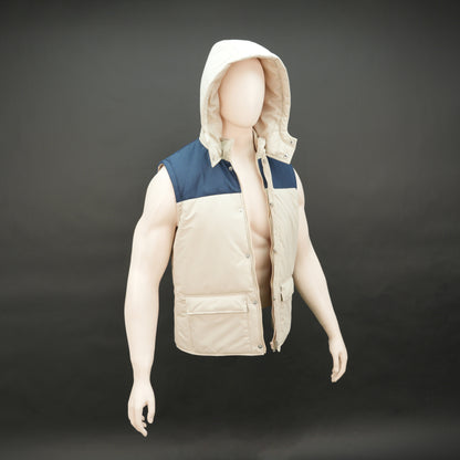 Cream-blue two-tone sleeveless puffer jacket with zip and snap closure, hood, side and inner pockets, quilted for layering
