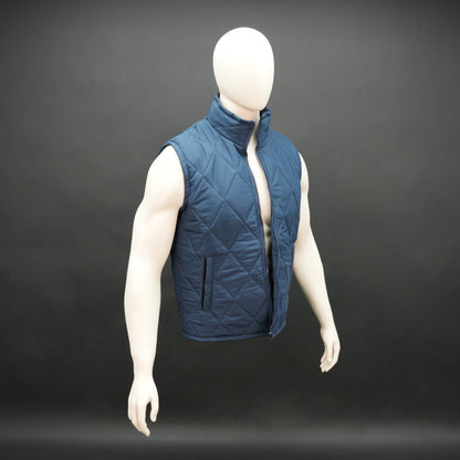 Blue sleeveless puffer vest with zip, side and inside pockets, lightweight for layering
