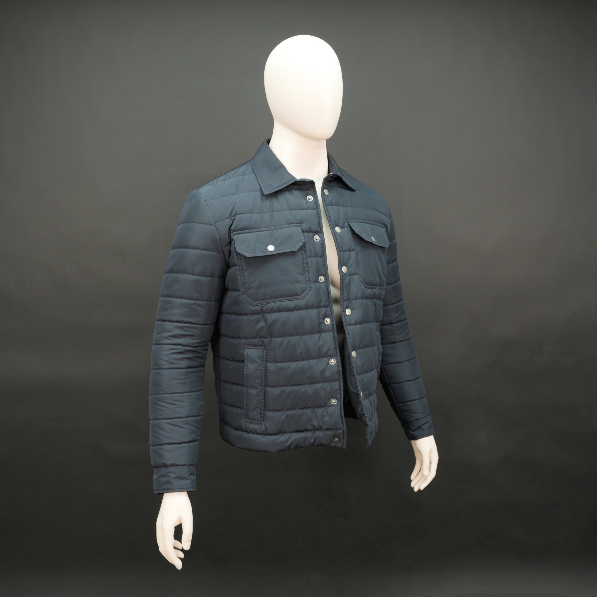 Navy full-sleeve puffer jacket with snap closure, quilted design, inner and outer pockets, crafted for everyday warmth