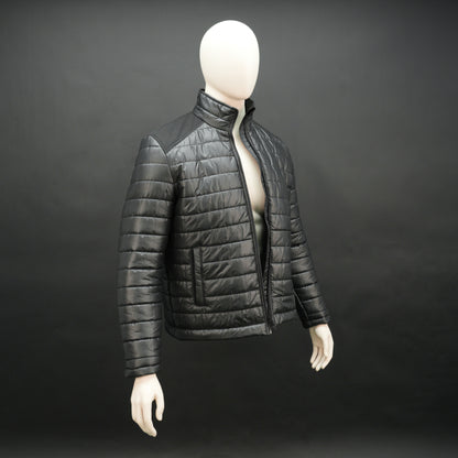 Black full-sleeve two-tone puffer jacket with snap pockets, quilted insulation, inner compartments, and zip closure