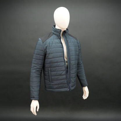 Navy full-sleeve two-tone puffer jacket with snap pockets, quilted insulation, inner compartments, and zip closure