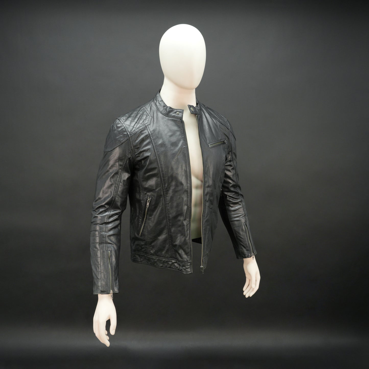 Black jacket model 2212 featuring a front zip closure, two side pockets, an upper right-side front pocket, zip cuffs, an inside zipper pocket, and a snap-button collar. Sleek, modern design with versatile everyday style