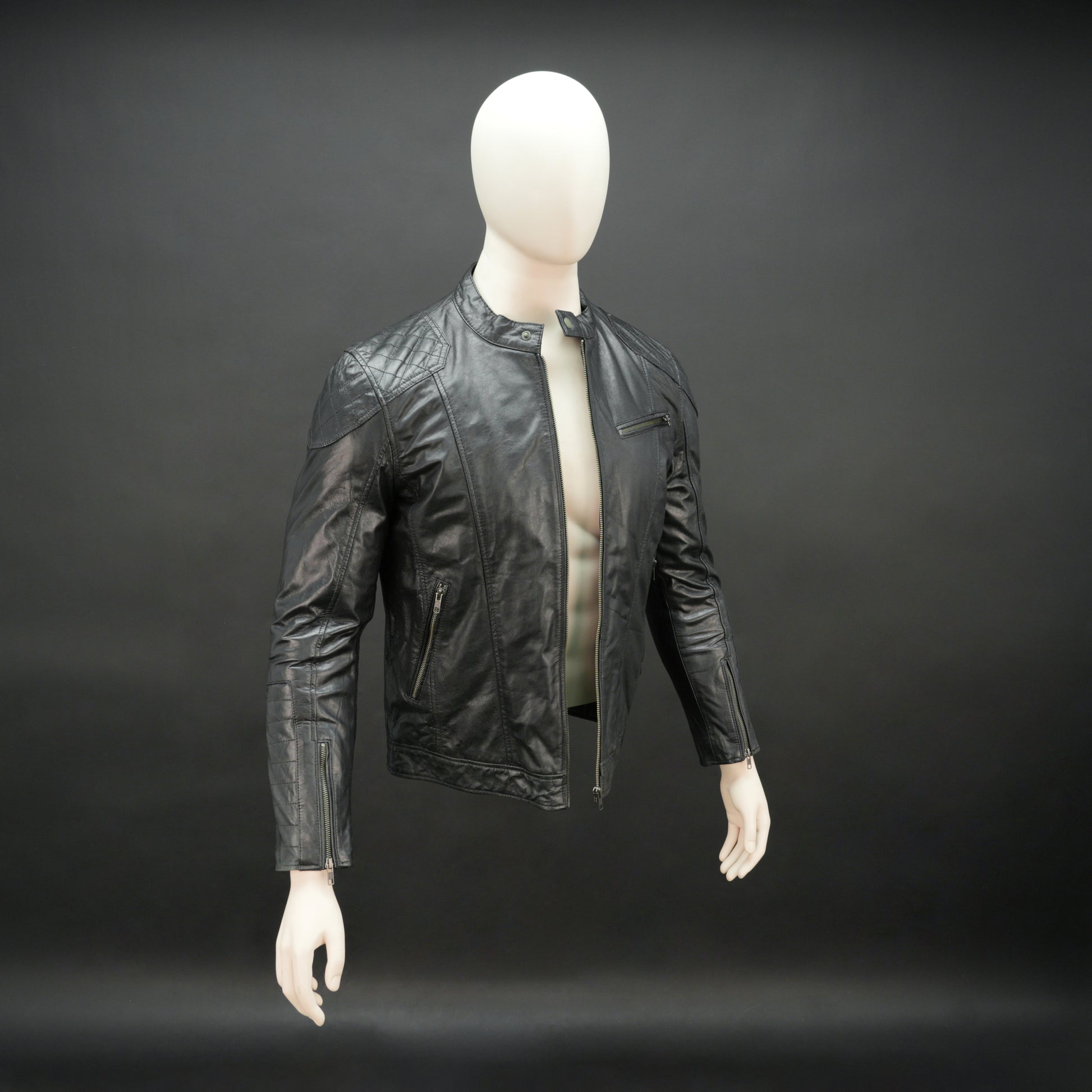 Black jacket model 2212 featuring a front zip closure, two side pockets, an upper right-side front pocket, zip cuffs, an inside zipper pocket, and a snap-button collar. Sleek, modern design with versatile everyday style