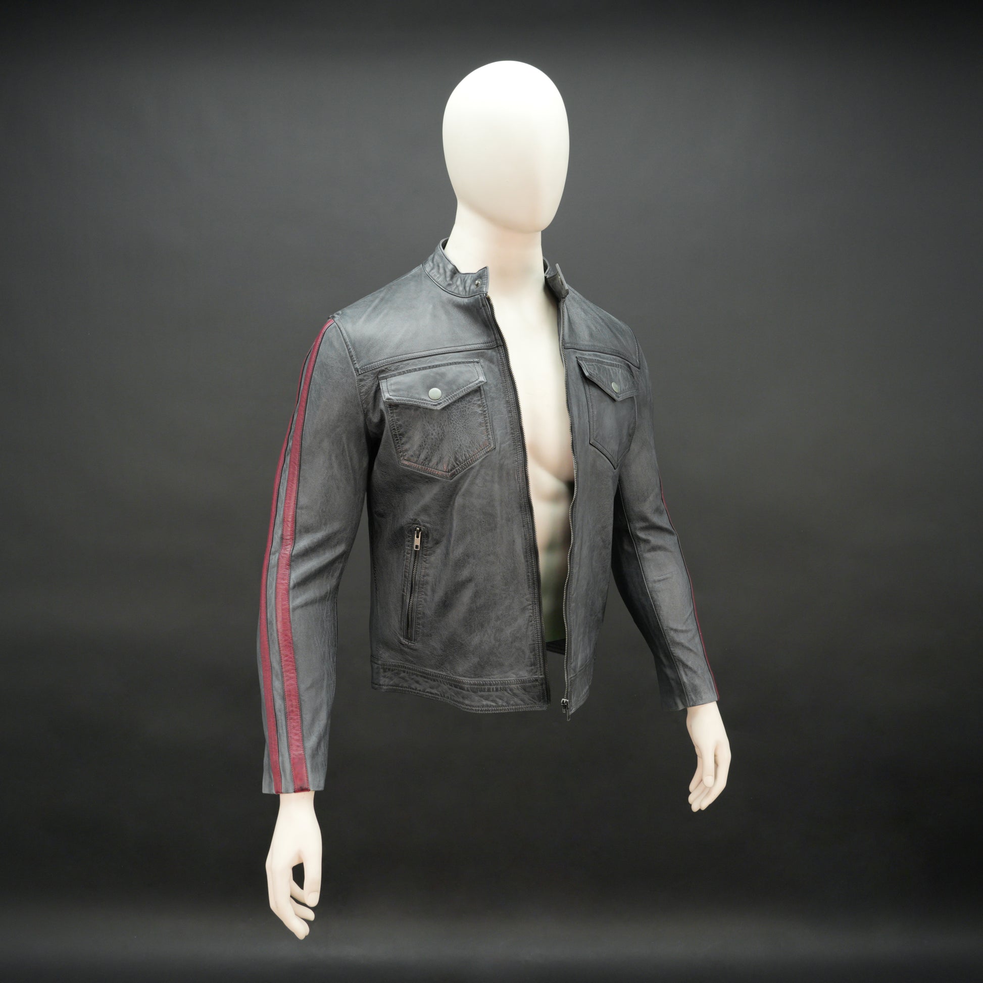 Black jacket 6010 with front zip closure, snap-button collar, multiple pockets, and red arm stripes, combining style and practicality for everyday wear