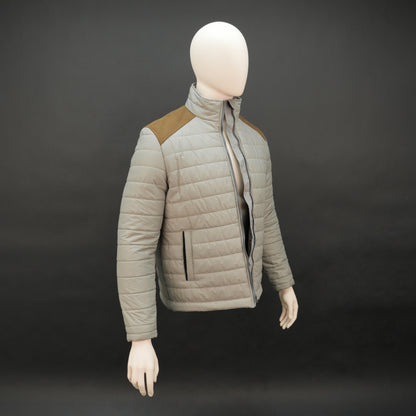 Grey full-sleeve two-tone puffer jacket with snap pockets, quilted insulation, inner compartments, and zip closure