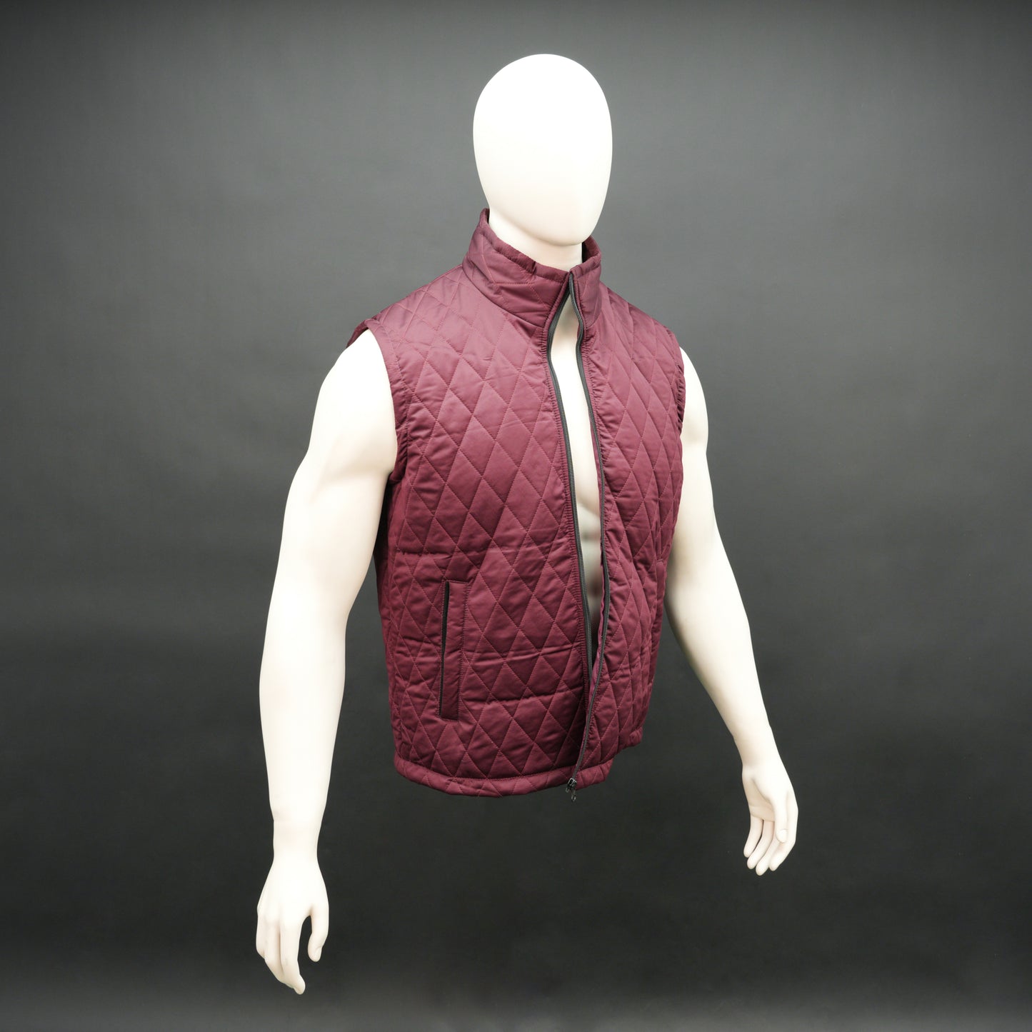 Maroon quilted sleeveless  puffer vest with zip closure, side and inside pockets, ideal for layering