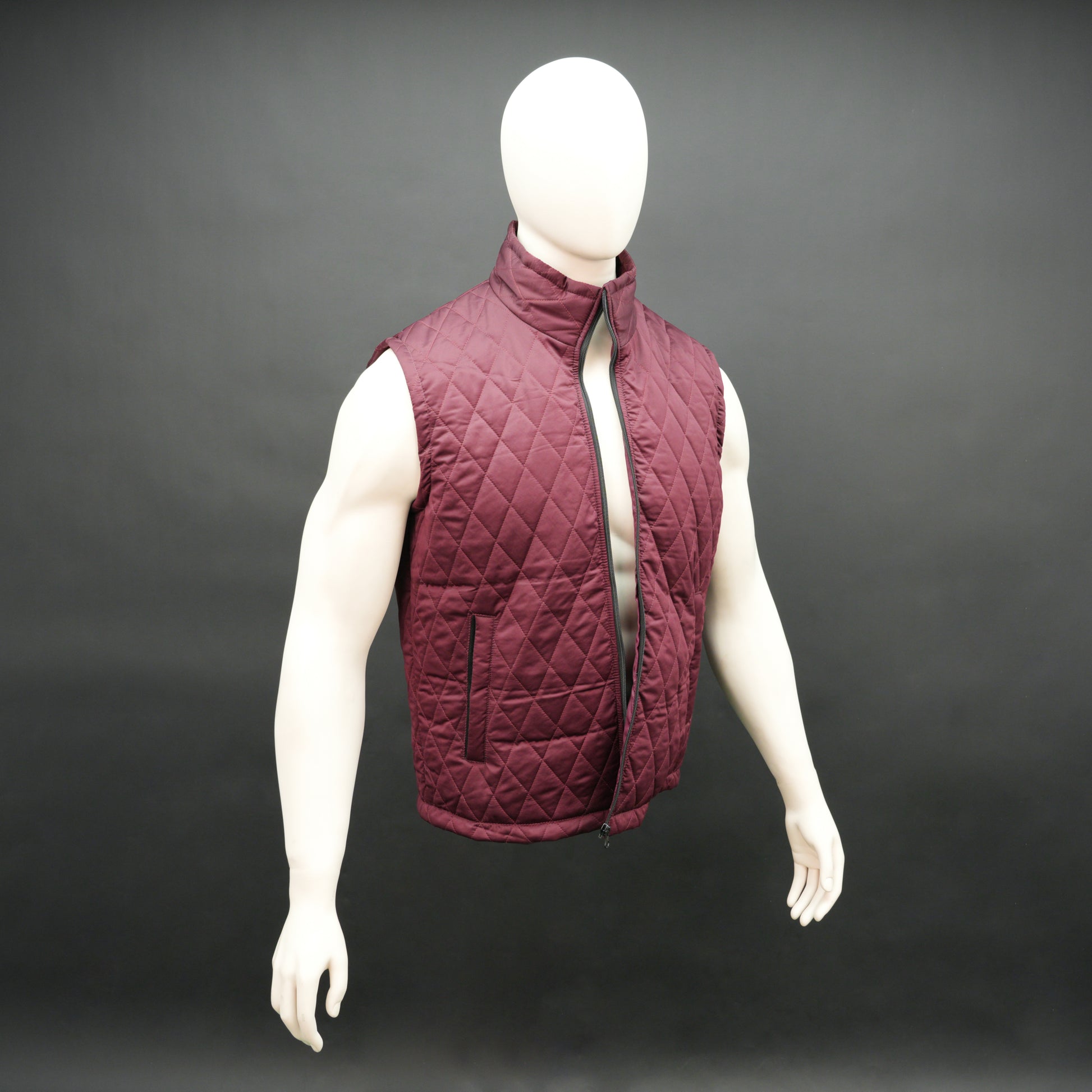 Maroon quilted sleeveless  puffer vest with zip closure, side and inside pockets, ideal for layering