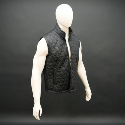 Lightweight black quilted sleeveless  puffer vest with zip closure, side and inside pockets, ideal for layering