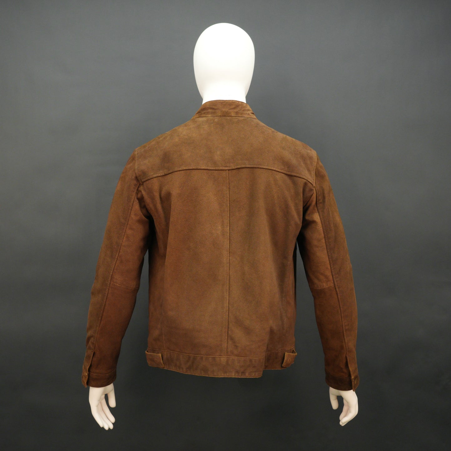 Brown suede leather jacket with front pocket and unique button and zip opening