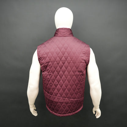 Maroon quilted sleeveless  puffer vest with zip closure, side and inside pockets, ideal for layering