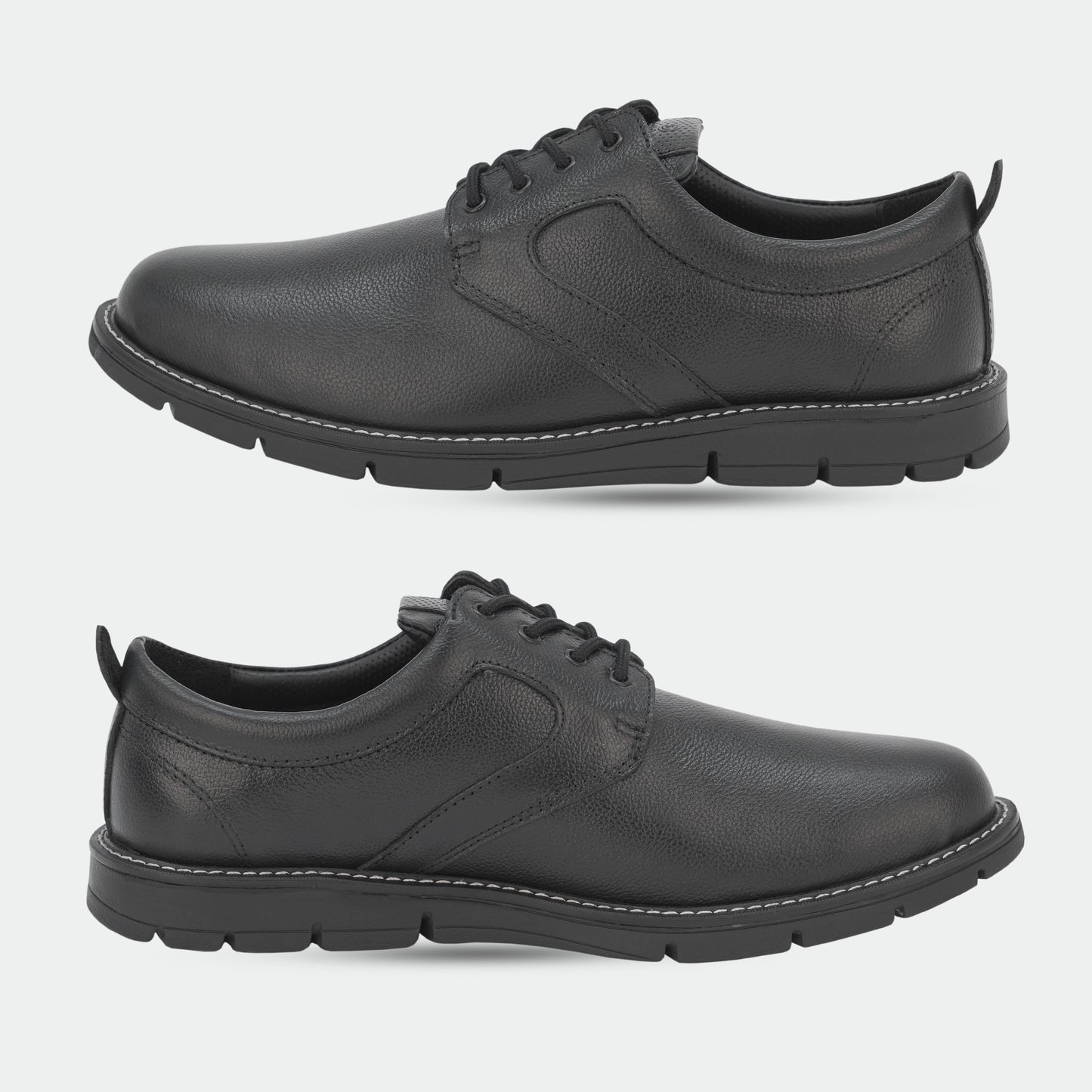 Black footwear featuring genuine cow leather milled commute upper, soft sheep lining, Taxon insole for stability, and lightweight EVA sole for comfort and grip