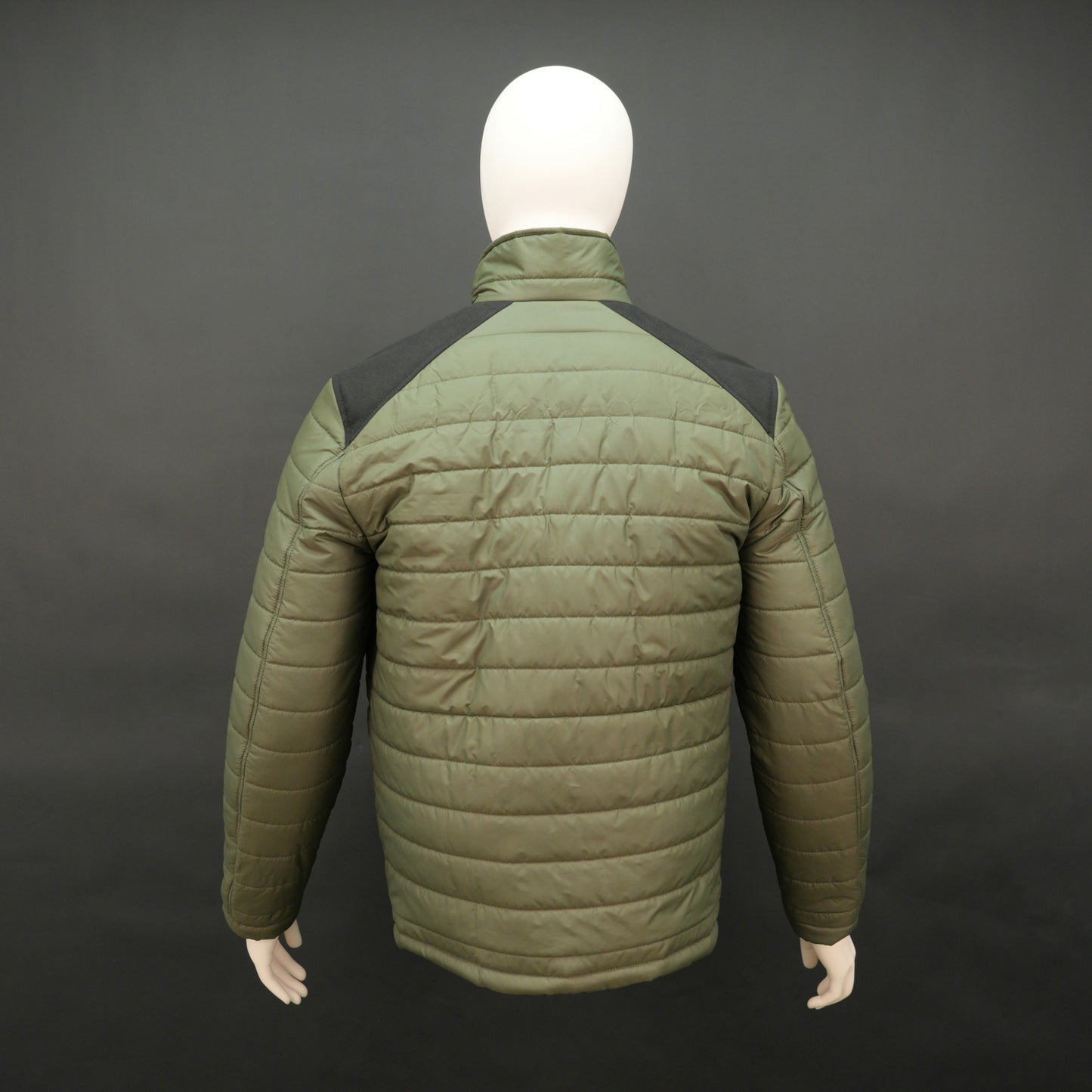 Green full-sleeve two-tone puffer jacket with snap pockets, quilted insulation, inner compartments, and zip closure