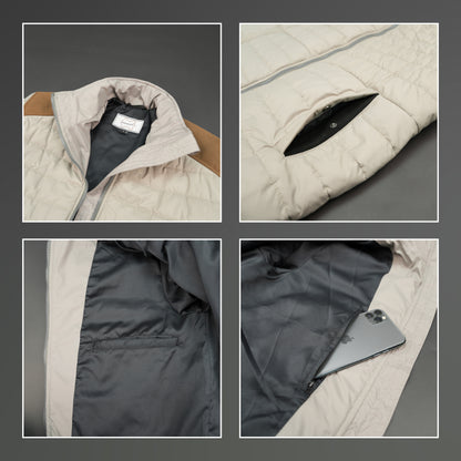 Grey full-sleeve two-tone puffer jacket with snap pockets, quilted insulation, inner compartments, and zip closure