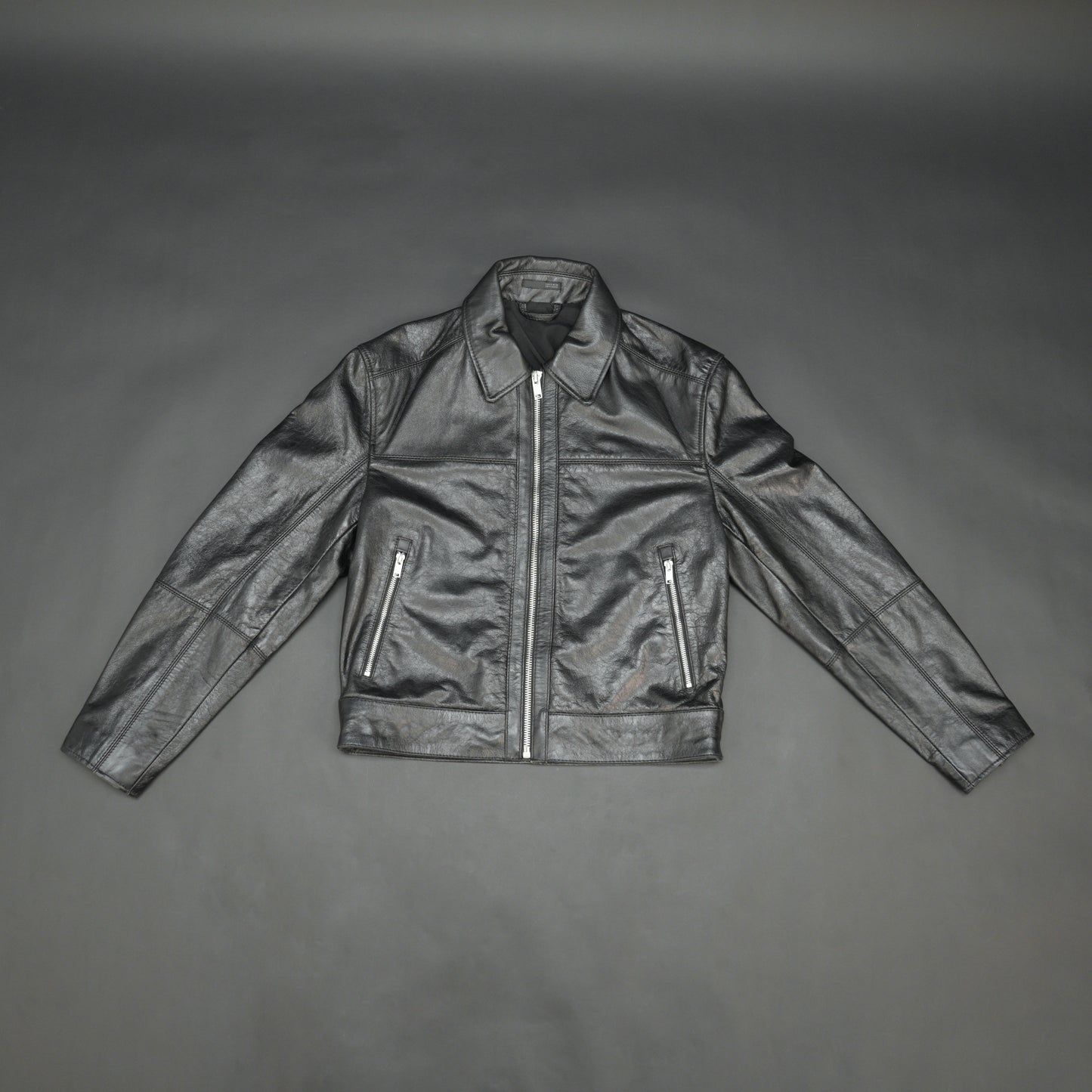 Black leather jacket premium leather, zipper opening, and two front side pockets