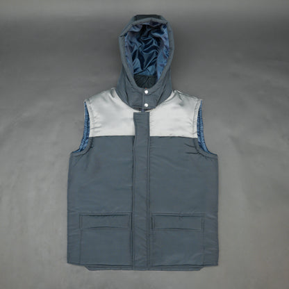 Navy-grey sleeveless puffer jacket with zip and snap closure, hood, side and inner pockets, premium fabric for warmth.