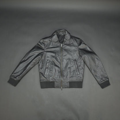 Black sheep leather jacket with soft material, front and inside pockets, and zip closure
