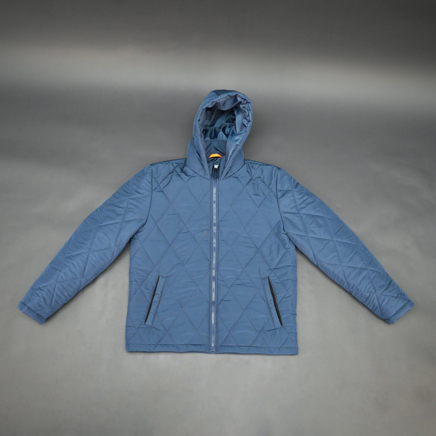 Blue full-sleeve puffer jacket with zip and hood, side and inner pockets, suitable for cold and windy weather