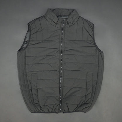 Black garment featuring a front zip closure, two snap-button side pockets, and two inside pockets for secure, convenient storage